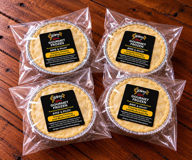 Swingz Kitchen pack of four creamy chicken and mushroom frozen pies in individual foil containers.