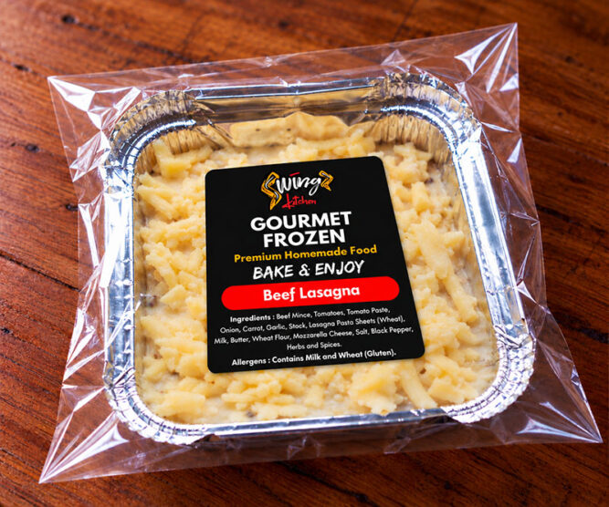 Swingz Kitchen homemade frozen beef lasagna in a foil container, ready to cook.
