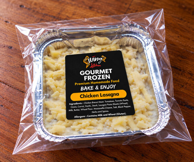 Swingz Kitchen homemade frozen chicken lasagna in a foil container, ready to cook.